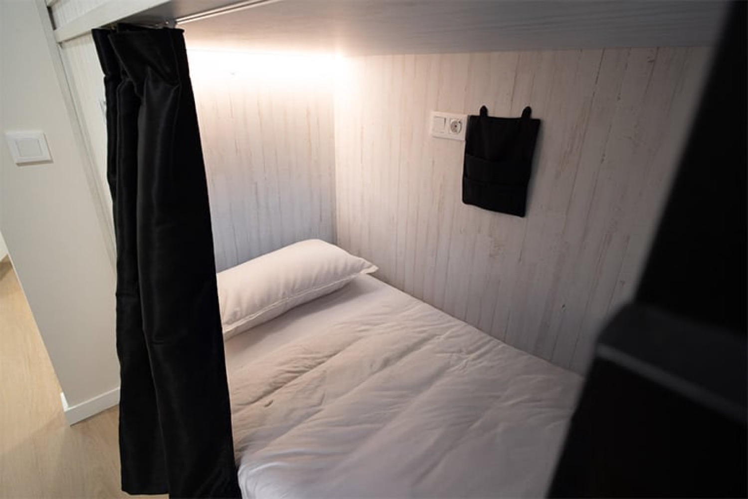 Bunk bed with privacy curtain and its own light
